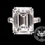 Diamond Ring: One ladies diamond engagement ring consisting of: one emerald cut diamond weighing 10.54 cts. Diamond is VS2 in clarity, F in color. Diamond is of extremely fine proportions with GIA certificate # 8376741. Diamond is set in a platinum hand-made mounting with two baguette diamonds on each side, total weight .90 cts. Baguettes are VS in clarity F in color.